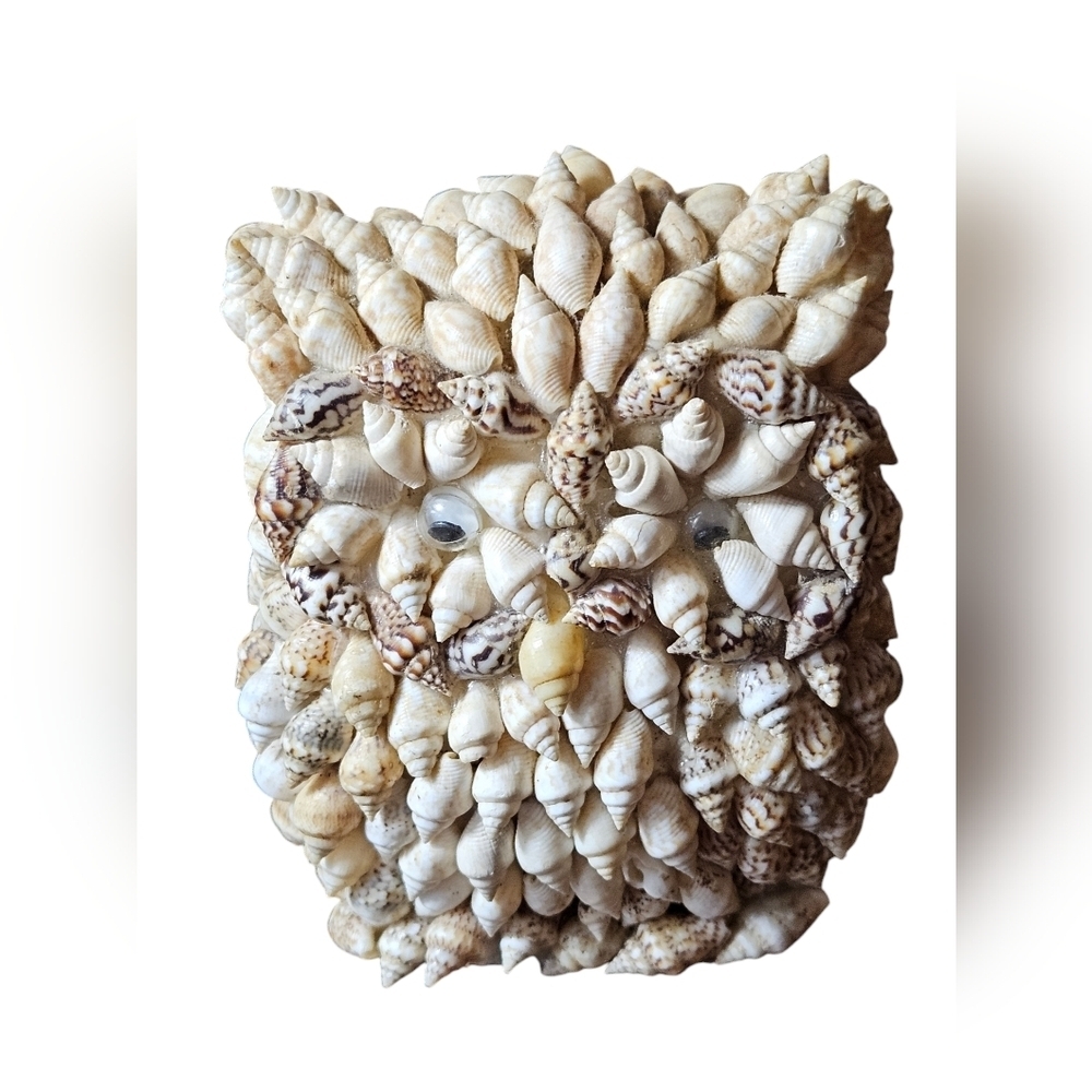 Vintage seashell owl figurine.